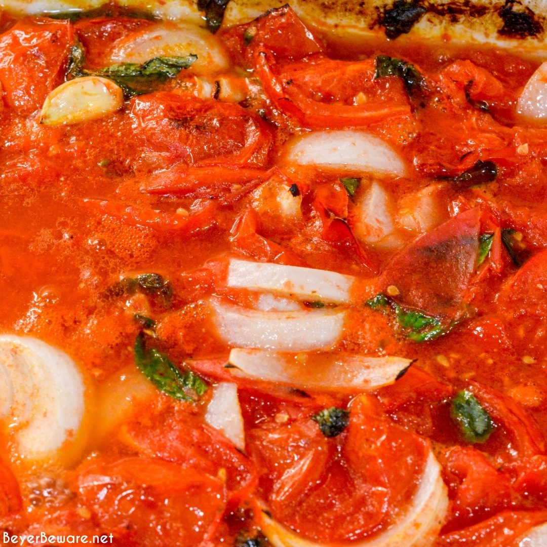 Tomato basil sauce is easy to make by oven roasting the tomatoes, garlic, onions, basil, and olive oil before pureeing into the sauce.