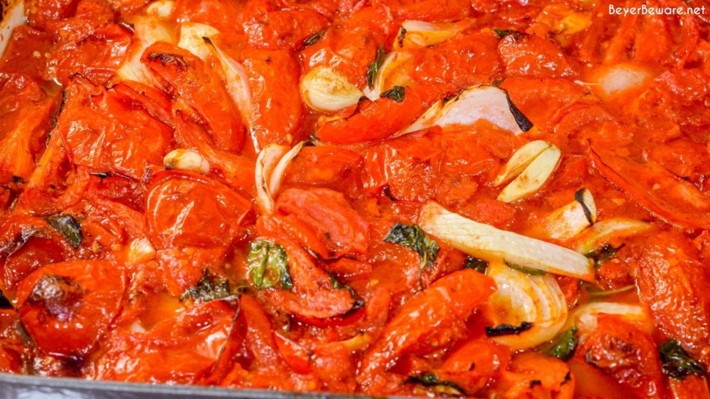 Tomato basil sauce is easy to make by oven roasting the tomatoes, garlic, onions, basil, and olive oil before pureeing into the sauce.