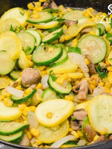 Skillet zucchini and summer squash recipe with corn and mushrooms is a quick sauteed squash recipe that comes together with lots of flavors thanks to onions, garlic, and fresh herbs.