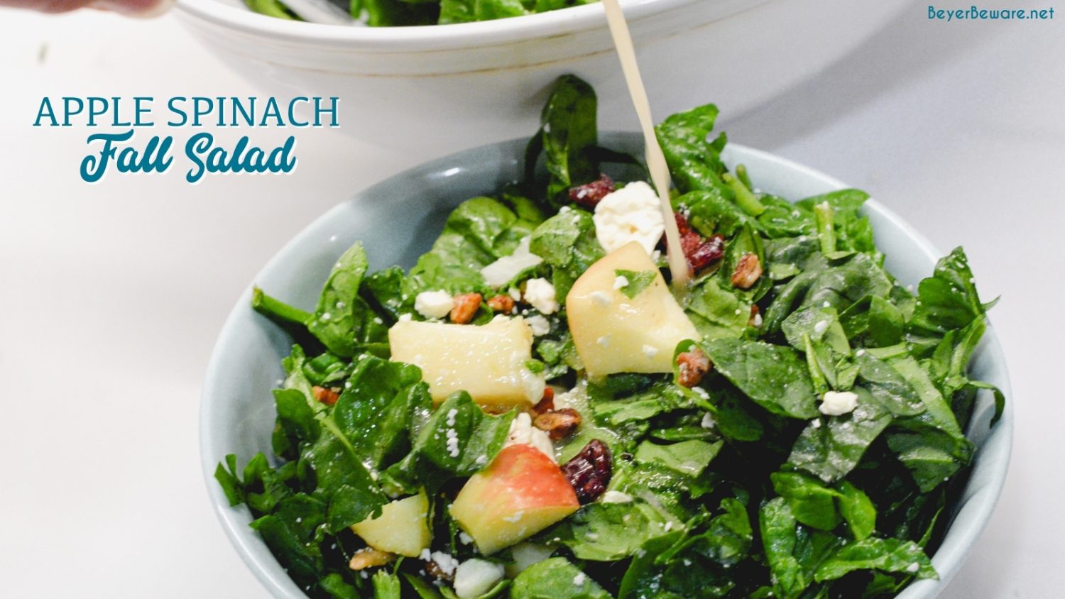 Apple spinach salad is a sweet and savory mixture of spinach, apples, pecans, cranberries, and feta cheese finished with a maple dijon vinaigrette.