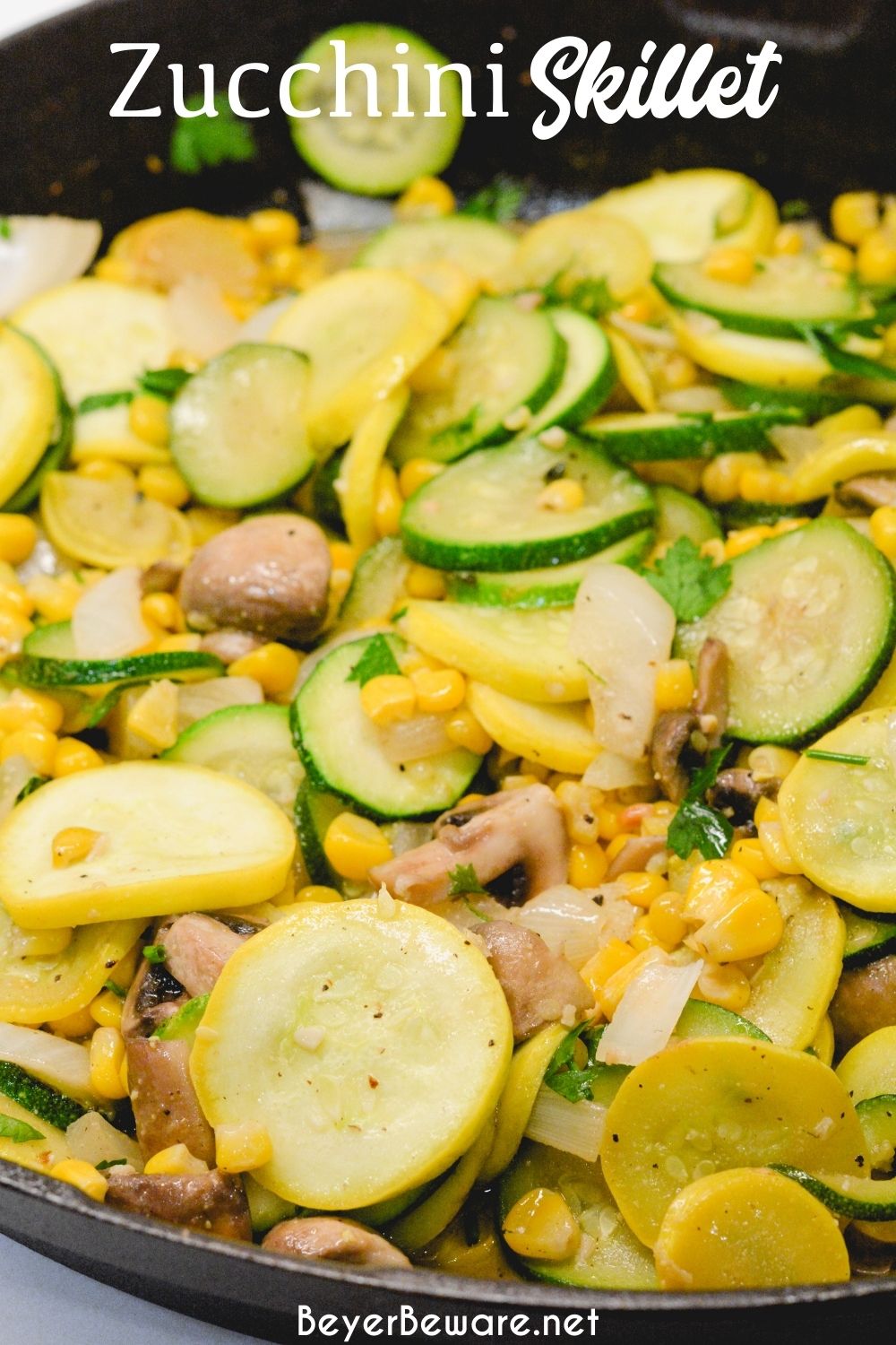 Skillet zucchini and summer squash recipe with corn and mushrooms is a quick sauteed squash recipe that comes together with lots of flavors thanks to onions, garlic, and fresh herbs.