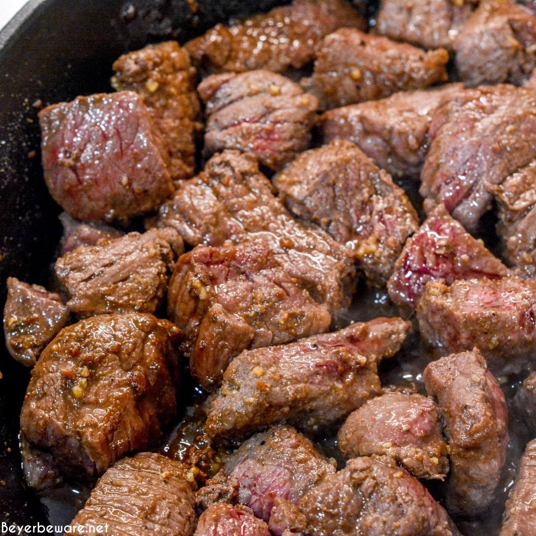 Stew meat sautéing in the skillet 