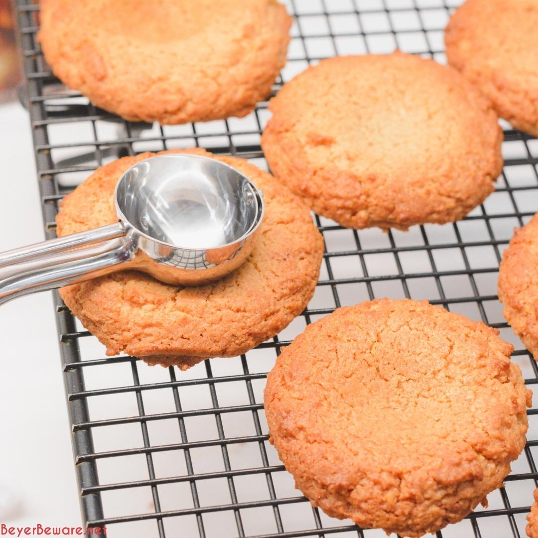 Peanut Butter caramel cookies are an easy non-chocolate Christmas cookie recipe that is easy to make with a cookie mix for peanut butter blossoms with caramel.