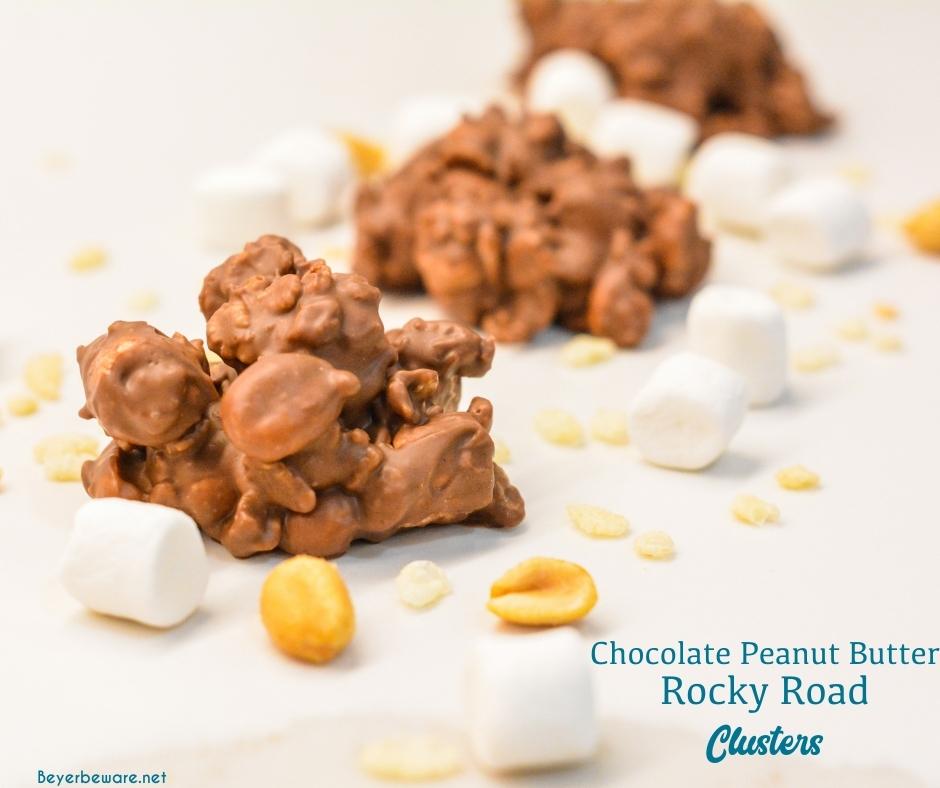 Chocolate peanut butter rock road clusters combine peanut, marshmallows, and rice krispies with melted dark and white chocolate and peanut butter for over-the-top peanut clusters.