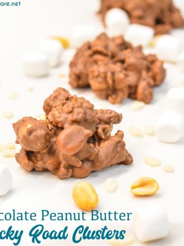 Chocolate peanut butter rock road clusters combine peanut, marshmallows, and rice krispies with melted dark and white chocolate and peanut butter for over-the-top peanut clusters.