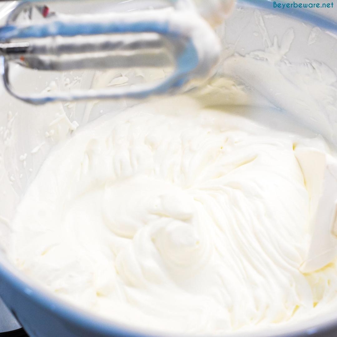 Pour the heavy whipping cream into a large bowl and begin whipping with either a hand mixer or a stand mixer. When peeks start to form, you can quit and move to the next step. This will take 5-7 minutes to do. Do not add sugar at this point.