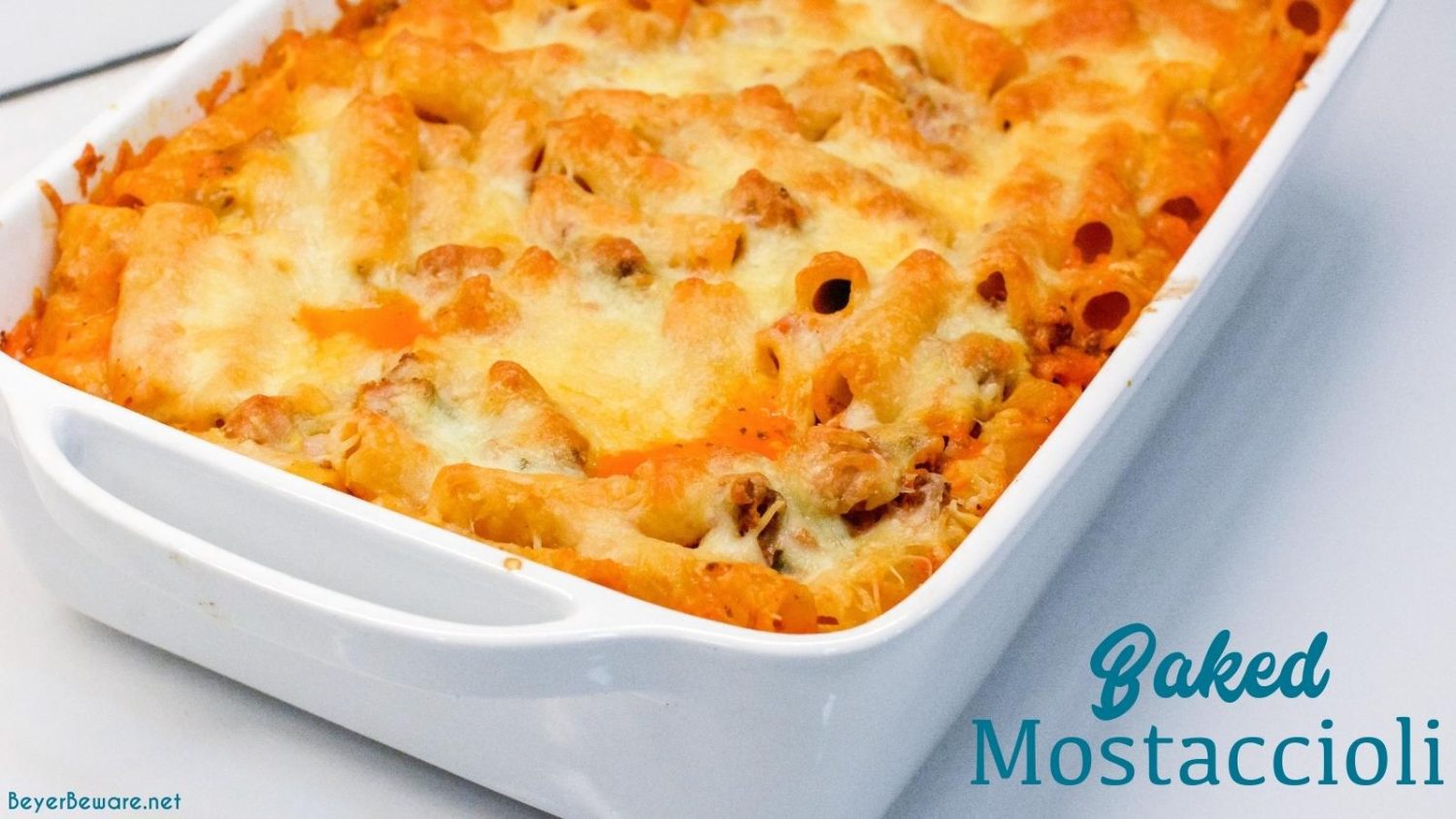 Mostaccioli bake is a hearty Italian casserole made with pasta, sausage, tomato sauce, cheese, and lots of seasoning.