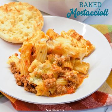 Mostaccioli bake is a hearty Italian casserole made with pasta, sausage, tomato sauce, cheese, and lots of seasoning.