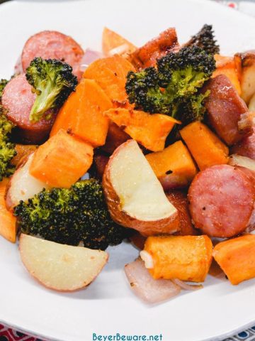 Sheet pan smoked sausage, potatoes, and broccoli is a simple oven roasted sausage and sweet potatoes meal that is full of flavors from onions and garlic and roasted in 45 minutes.