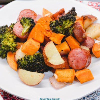 Sheet pan smoked sausage, potatoes, and broccoli is a simple oven roasted sausage and sweet potatoes meal that is full of flavors from onions and garlic and roasted in 45 minutes.