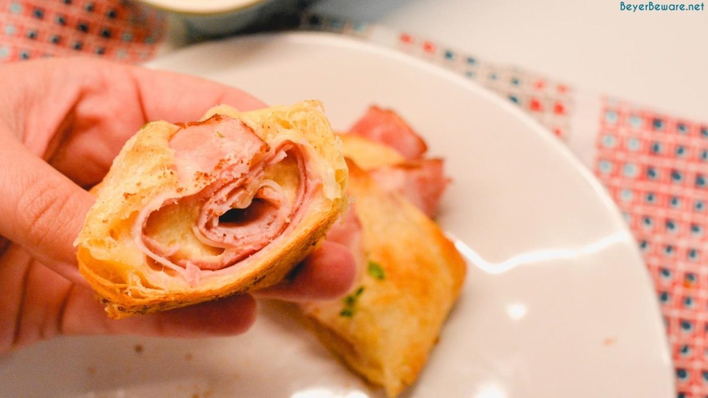 The ham and cheese croissants are buttery and gooey plus garlicky with the addition of garlic butter to the top of the croissants.