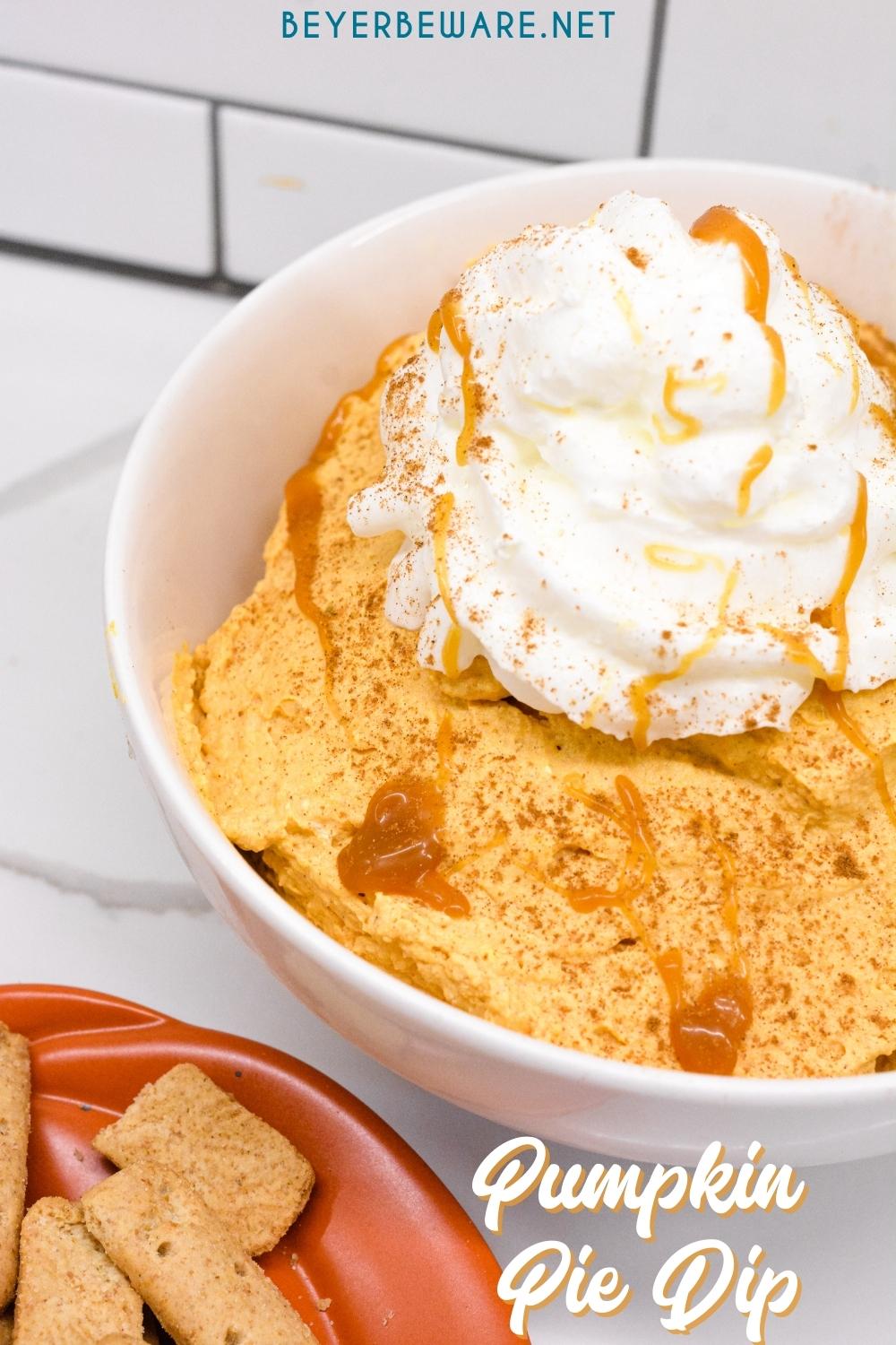 Pumpkin Fluff Dip is a simple recipe for the creamiest pumpkin dip made with whipped topping, canned pumpkin, vanilla pudding, and pumpkin pie spice.