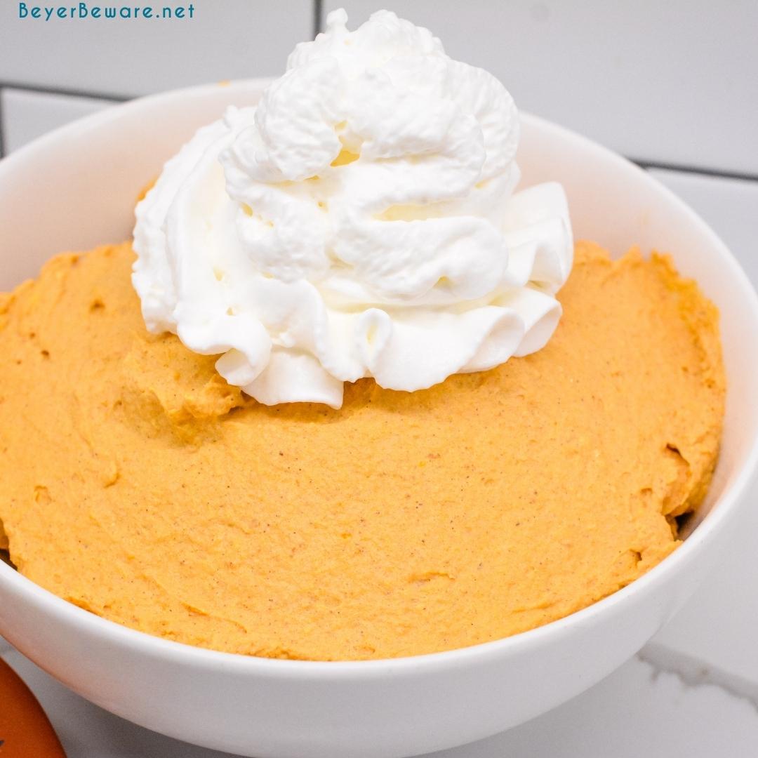 Transfer the pumpkin fluff to your serving bowl and top with whipped topping.