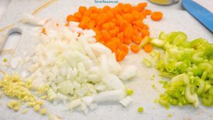 Dice the onions, carrots, celery, and garlic and set aside for the potato and ham soup