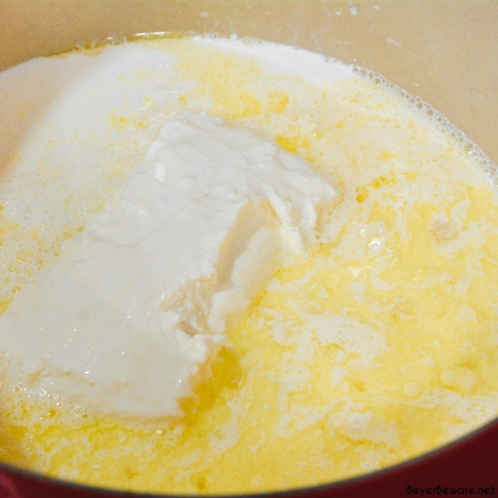 Add the cream and cream cheese to the butter and garlic. Gently stir the cream and cream cheese together until cream cheese is melted.