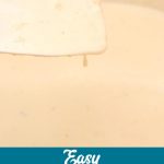 This easy Alfredo sauce with cream cheese recipe made with five ingredients in under 10 minutes is the base for many fast weeknight meals.