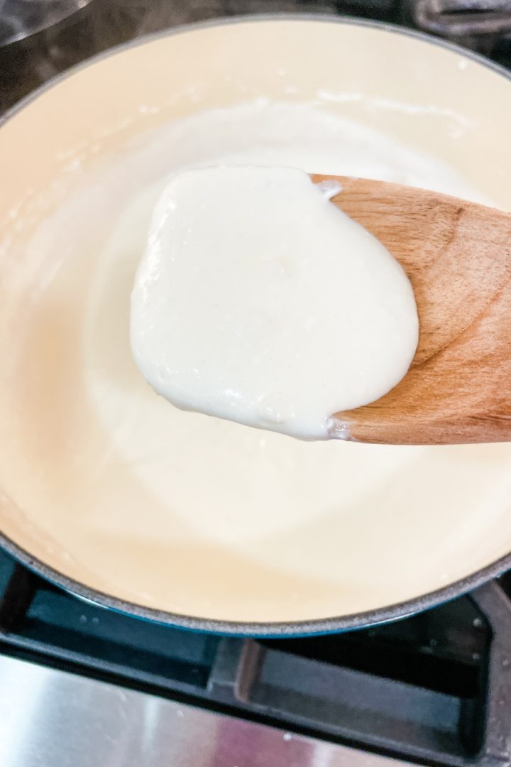 This easy Alfredo sauce with cream cheese recipe made with five ingredients in under 10 minutes is the base for many fast weeknight meals.