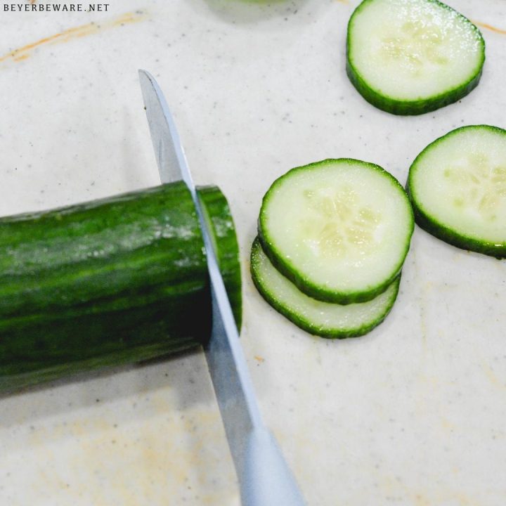 Slice the cucumbers into thin slices and then set them aside.