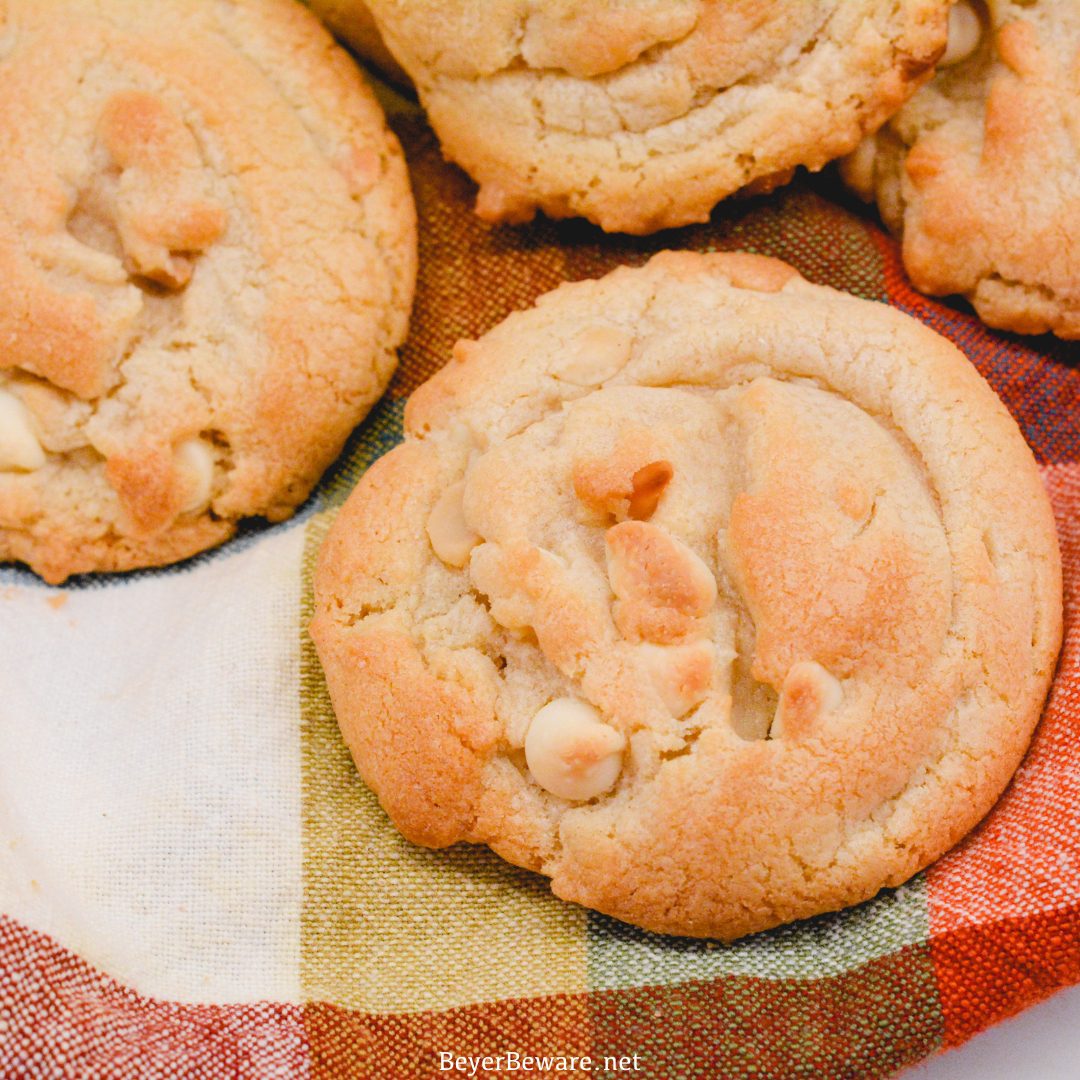 The softest white chocolate macadamia nut cookies you will make have butter, shortening, white chocolate chips, and instant pudding in them.