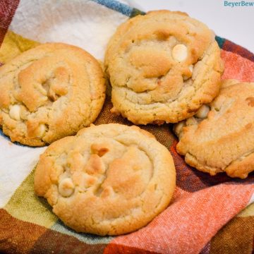 The softest white chocolate macadamia nut cookies you will make have butter, shortening, white chocolate chips, and instant pudding in them.