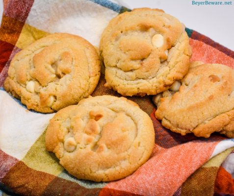 The softest white chocolate macadamia nut cookies you will make have butter, shortening, white chocolate chips, and instant pudding in them.