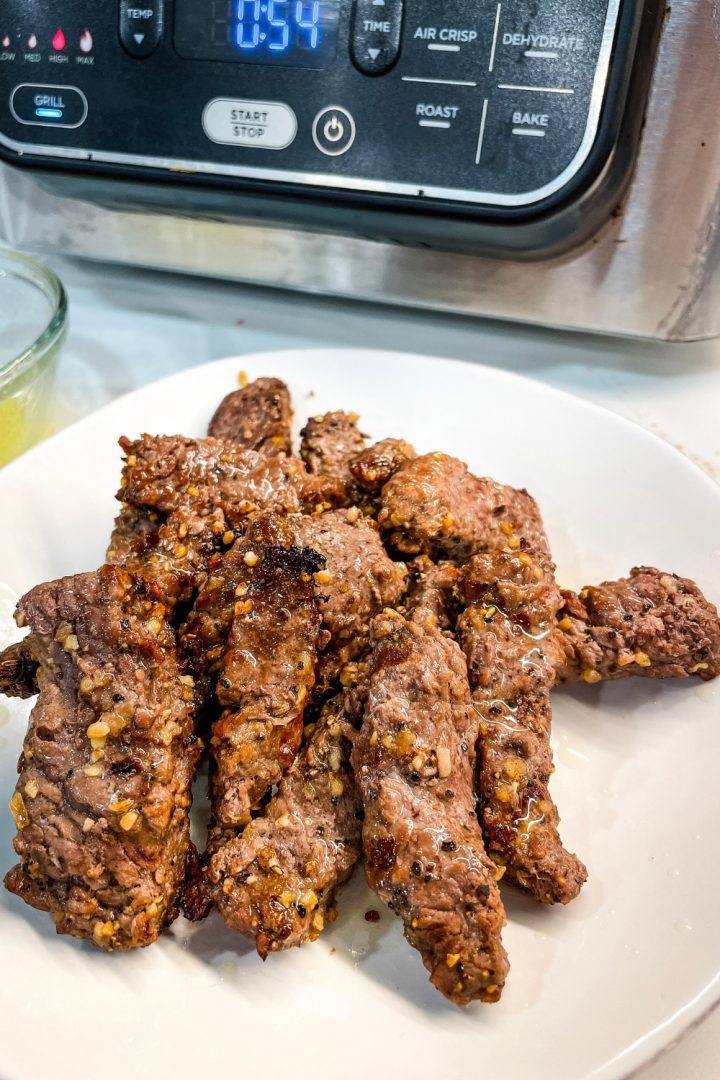 Air fryer cube steak fingers are a naked steak finger made with a simple marinade of avocado oil and Worcestershire sauce and then seasoned with steak seasoning and then air fried.