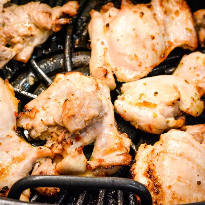 Start by marinating chicken in Italian dressing for 30 minutes. Then grill or baked chicken thighs or breast with a simple seasoning.