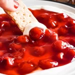 Just five ingredients make up this sweet & smooth Cherry Cheesecake Dip recipe! It's the perfect appetizer (or no-bake dessert!) for any occasion!