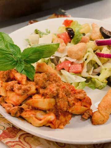 These ingredients for a simple red sauce and cheese tortellini casserole are pantry and freezer staples.