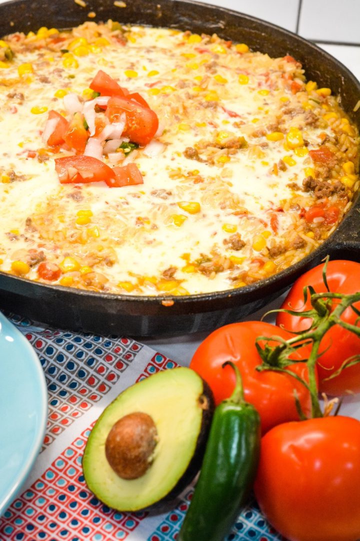If you are looking for a quick and easy ground beef recipe, this arroz con carne molida is the perfect Mexican cheesy rice and ground beef skillet.