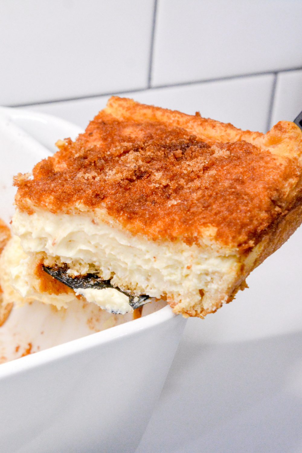 Snickerdoodle cookies and cheesecake combine for these snickerdoodle cheesecake bars made with a double crust of crescent rolls for yummy cinnamon cream cheese bars.