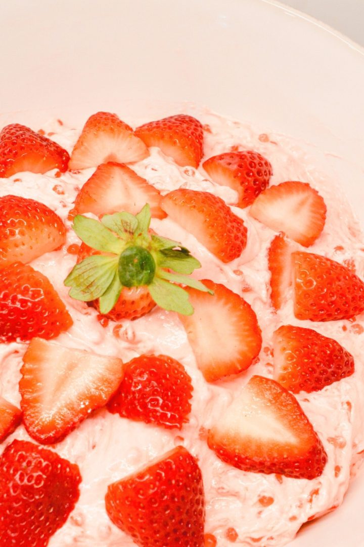 Making this old-fashioned strawberry tapioca salad will create the best pink fluff salad with small pearl tapioca, strawberry jello, and cool whip.