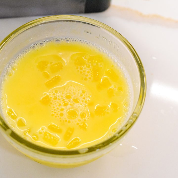 In a small bowl, combine egg yolks with ice cold milk.