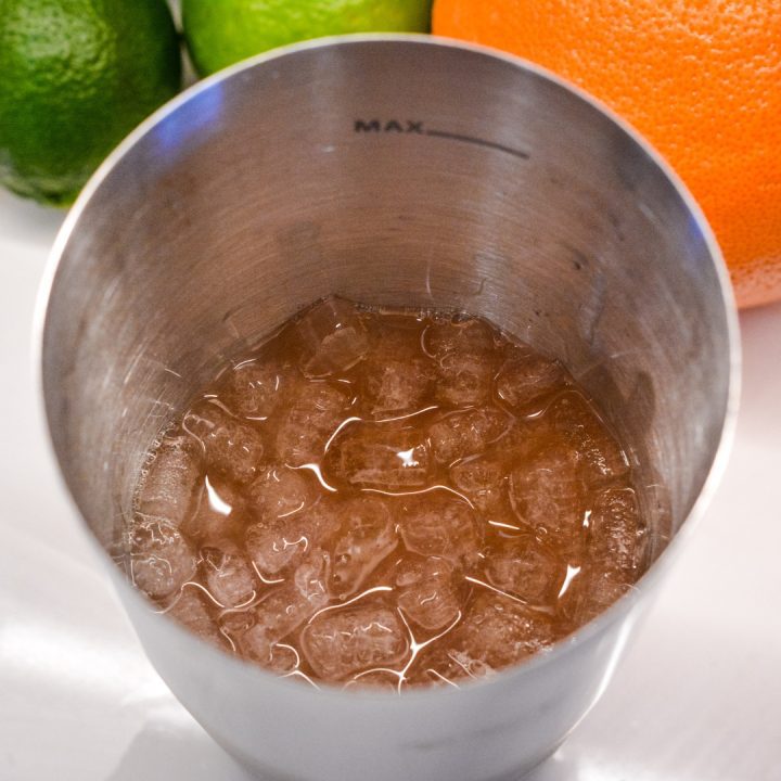 Fill a shaker with ice and then add the vodka, cranberry juice, and grapefruit juice.