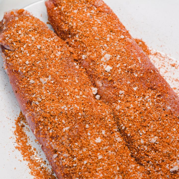 Combine all spices into a small bowl and rub on the pork tenderloins. Rub the loins in a little oil to help the rub stick.