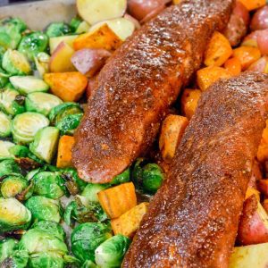 Place the pork tenderloins on top of the potatoes and Brussels Sprouts. Bake at 400 degrees for 35-45 minutes or until the pork tenderloin reaches 145 degrees.