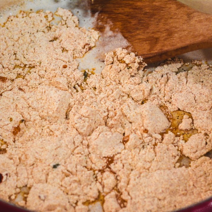 After the rice has browned, add the water and seasoning to the rice and cook as the instructions say.