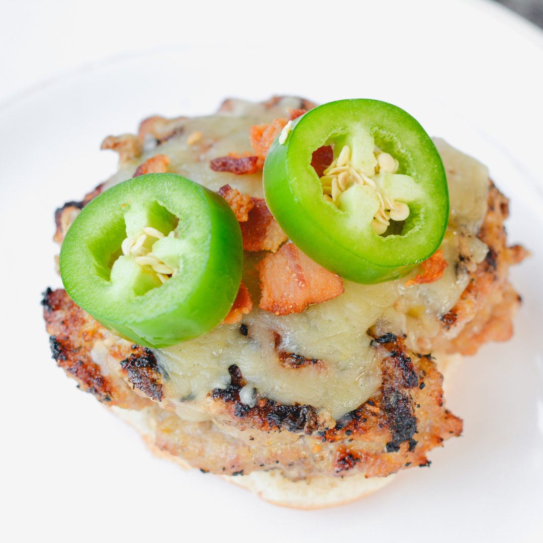 Garnish the burgers with more bacon crumbles and jalapeno slices. Serve on your favorite hamburger buns or sourdough bread.