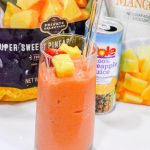 A combination of frozen strawberries, frozen pineapple, and frozen mango with orange and pineapple juice makes the best Tropical Smoothie Cafe Sunrise Sunset smoothie.