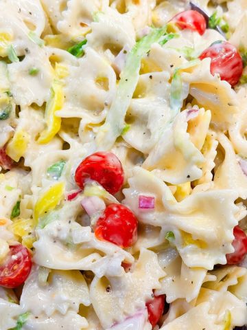 Prepare to be blown away by the Grinder Pasta Salad – a delightful fusion of both lettuce and pasta salads that guarantees to be the star of any summer spread especially for the people who love the tiktok sandwich slaw.