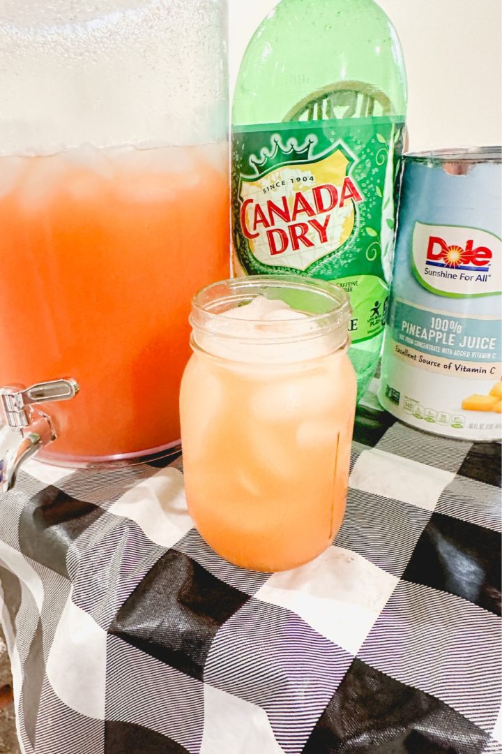 When the pink Country Time lemonade is mixed with the yellow of the pineapple juice, a fun orange punch is created with this pineapple lemonade punch that is slightly tart, and slightly sweet with a little fizz.