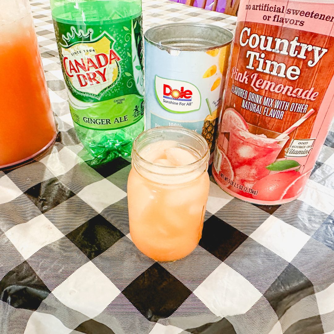 When the pink Country Time lemonade is mixed with the yellow of the pineapple juice, a fun orange punch is created with this pineapple lemonade punch that is slightly tart, and slightly sweet with a little fizz.