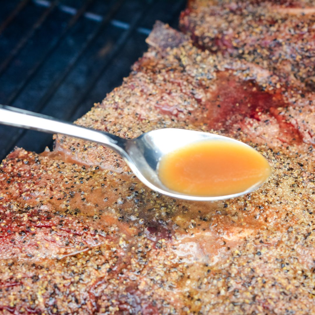 Place the beef roast on the smoker in indirect heat at 225 degrees. Every hour spritz or baste with beef broth.