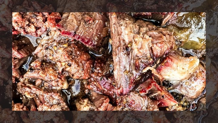 Smoked beef chuck roast will quickly become one of your favorite cuts of beef to smoke with a simple beef rub made with garlic, salt, and pepper and then finished in a pan of onions and beef broth.