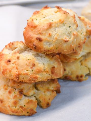 These savory blue cheese biscuits made with Bisquick are so simple to make using a biscuit mix, butter, blue cheese crumbles, and buttermilk.