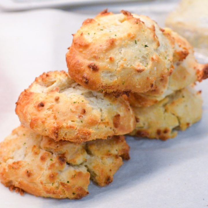 These savory blue cheese biscuits made with Bisquick are so simple to make using a biscuit mix, butter, blue cheese crumbles, and buttermilk.