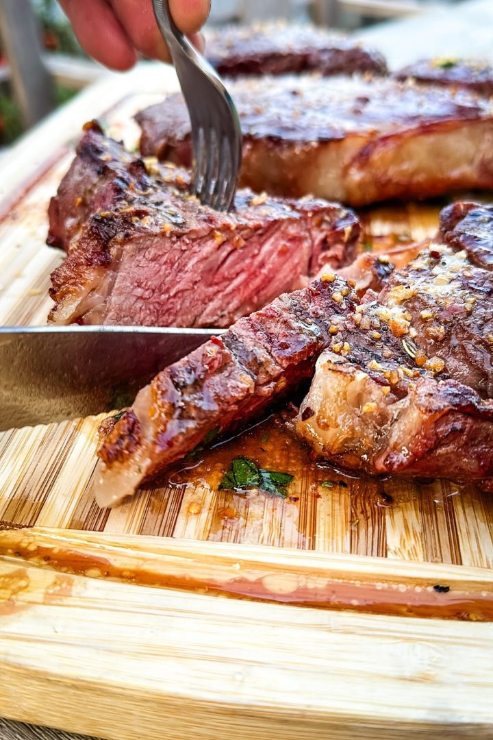 The ultimate grilled steak recipe isn't just about the recipe but choosing the best beef, the seasoning, and how to season and butter, grill, and rest the steak.
