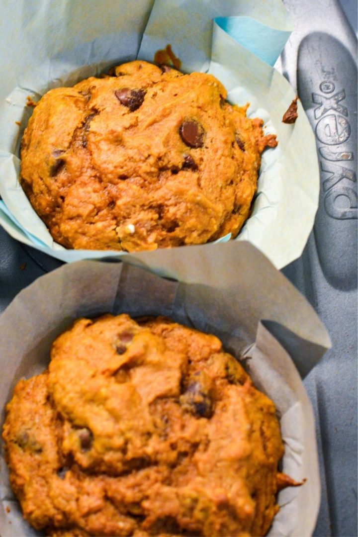 Pumpkin chocolate chip muffins made with a spice cake mix are easy to make with just four ingredients for a quick and easy fall treat.