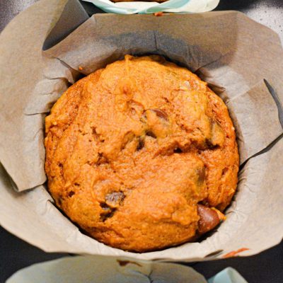 Pumpkin chocolate chip muffins made with a spice cake mix are easy to make with just four ingredients for a quick and easy fall treat.