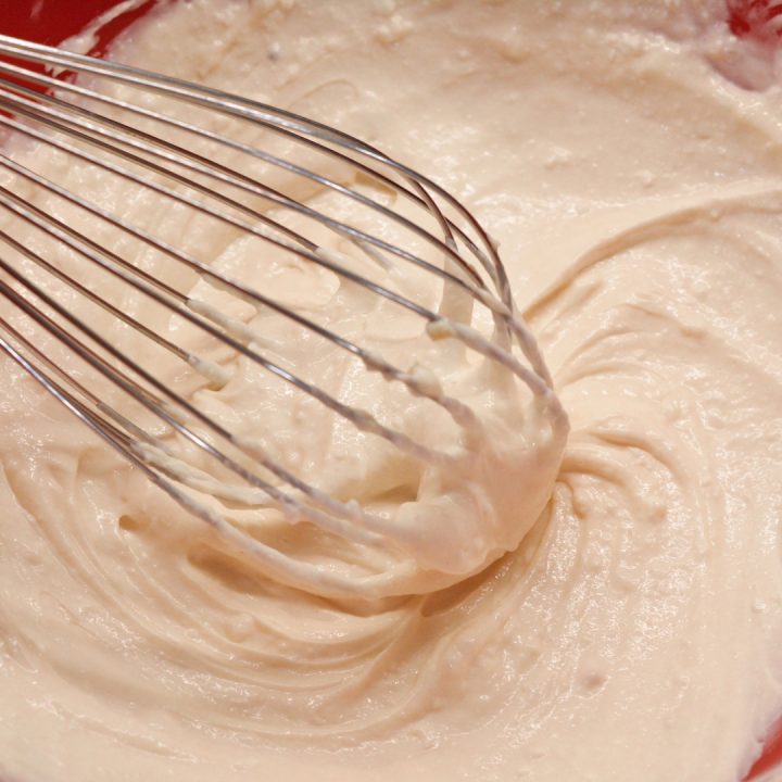 In a mixing bowl, combine the cream cheese, mayonnaise, Dijon mustard, and pickle juice. Whisk until everything is well incorporated.